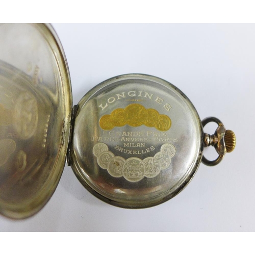 15 - Longines silver cased and engine turned open faced pocket watch, the bezel and rear cover with gold ... 