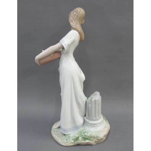 67 - Lladro Privilege society 2004 figure of a girl with a  basket of flowers, 26cm high