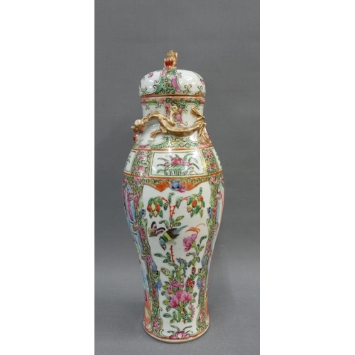 92 - Chinese famille rose baluster vase and cover, painted with figures and with gilt mythical beast hand... 