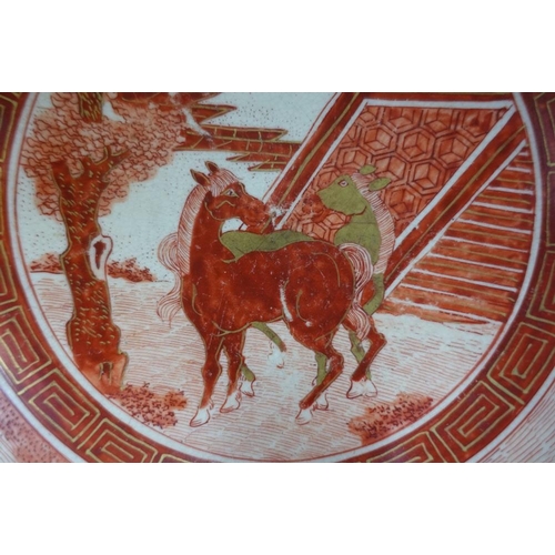 93 - Kutani bowl, painted with figures and horses, on a plain circular footrim with a Kutani backstamp, 2... 