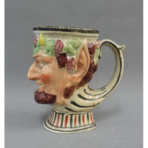 101 - Pearlware Bacchus moulded cup, 11cm high