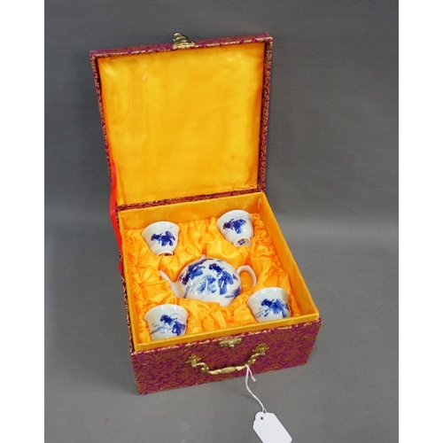 341 - Chinoiserie blue and white porcelain teaset, in a fabric covered and fitted box, with blue seal mark... 