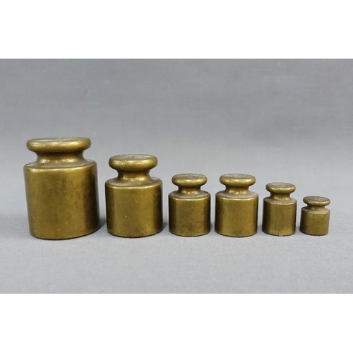 344 - Set of six brass weights, ranging from 50 grams to 1kg, (6)