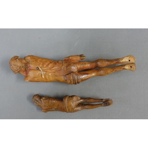 362 - Flemish carved fruitwood figure of Christ and another of smaller size, longest 29cm (2)