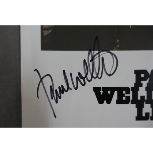 363 - Paul Weller Live, a signed black and white photograph, unframed, 21 x 29cm