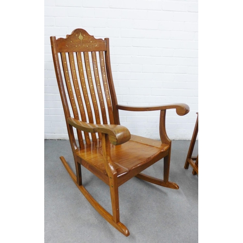 439 - Eastern hardwood and mixed metal inlaid rocking chair, 110 x 63cm, and a nest of four tables, (2)