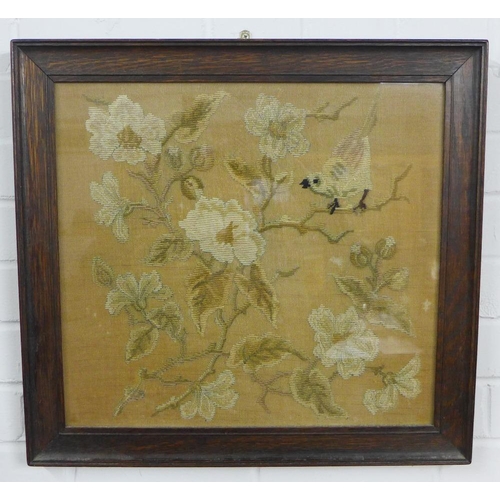 448 - Oak framed needlework panel depicting a bird, flowers and foliage, size overall 51 x 54cm