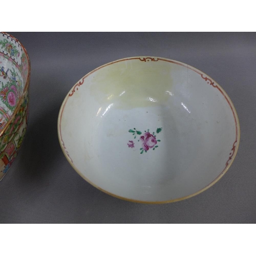 451 - Canton famille rose punch bowl, 40cm diameter, together with another smaller Canton bowl with restor... 