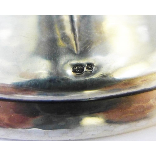 14 - Swedish planished silver bowl with leaf and grape pattern, on a spreading circular footrim, 24 x 18c... 