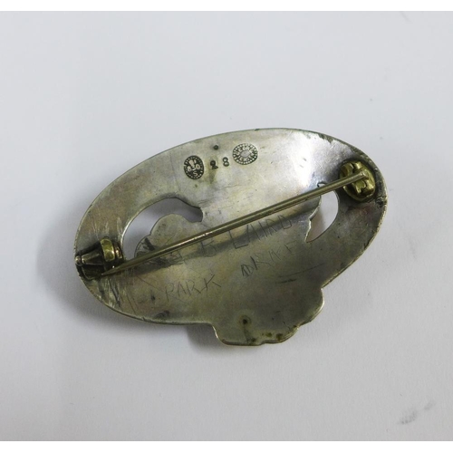 22 - Georg Jensen silver brooch, formed as three flowers with red cabouchon, stamped and number 28, with ... 