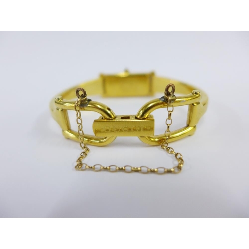 27 - Lady's Gucci gold plated wrist watch