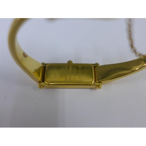 27 - Lady's Gucci gold plated wrist watch