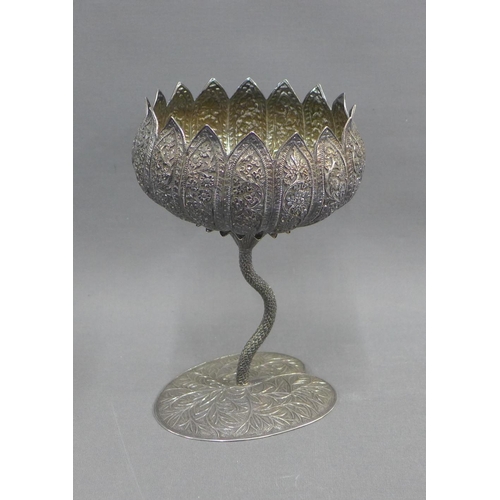 60 - Eastern white metal lotus bowl on a leaf shaped base, 19cm high