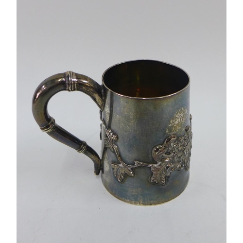 76 - Chinese Export  silver tankard by Wang Hing with embossed foliate pattern and faux bamboo, handle, 8... 