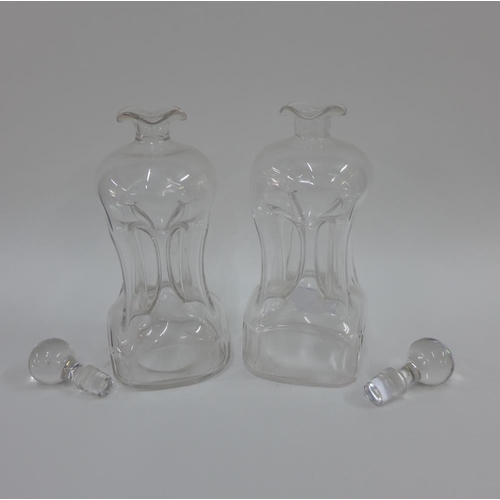 84 - A pair of gurgle glass decanters with stoppers and each with a Birmingham silver 'Whisky' decanter l... 