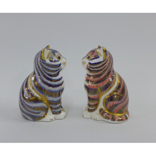 104 - Two Royal Crown Derby Imari Cat paperweights, one with the gold stopper, 8cm (2)