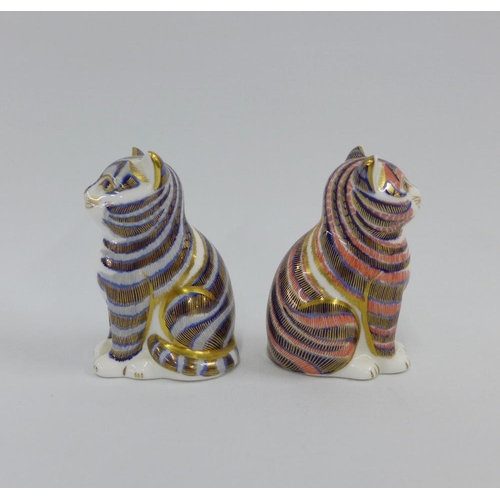 104 - Two Royal Crown Derby Imari Cat paperweights, one with the gold stopper, 8cm (2)