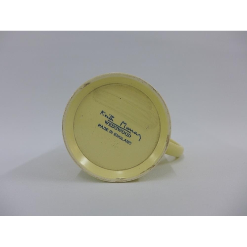 95 - Keith Murray for Wedgwood, a straw coloured pottery tankard, printed factory backstamps, 12cm high