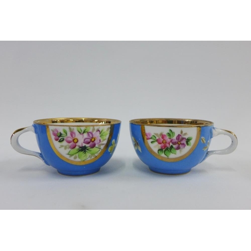 97 - Gardner Russian porcelain tea wares to include two cups and saucers with a pale blue ground and two ... 