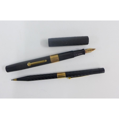 55 - Waterman fountain pens and pencil all with 9ct gold bands (4)