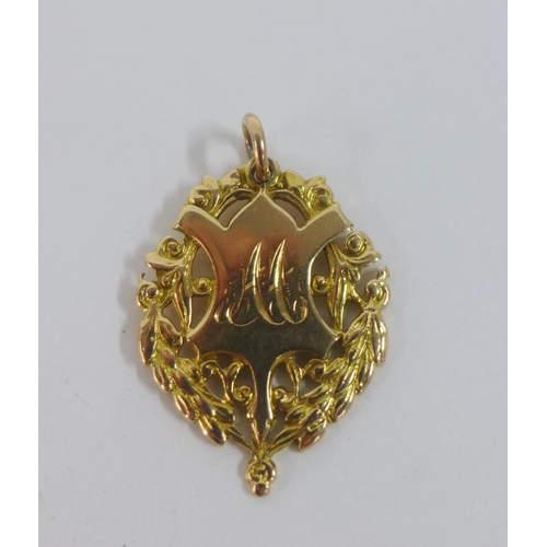 14 - Early 20th century 15ct gold fob medallion, approx 10g