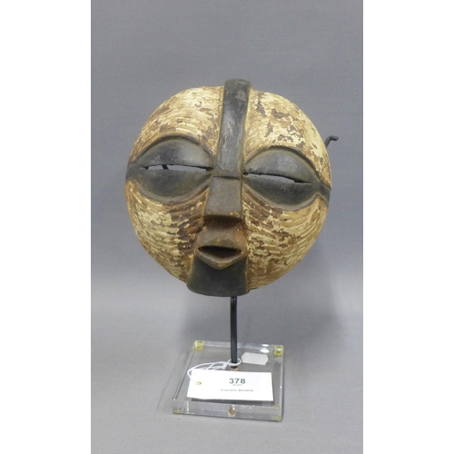 378 - African painted wood face mask, Kifwebe, Congo, raised on a metal stand with perspex base, height ov... 