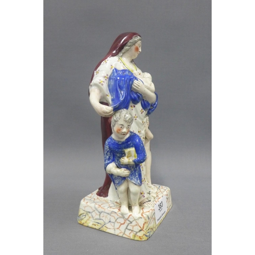 383 - Late 18th / early 19th century Staffordshire pottery figure 'Charity', 22cm high