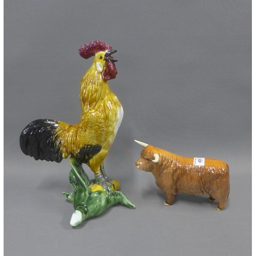 405 - Continental pottery Cockerel, 24cm,  and a Beswick highland cow, (a/f)