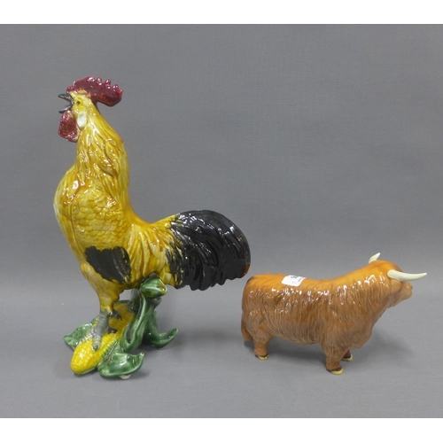 405 - Continental pottery Cockerel, 24cm,  and a Beswick highland cow, (a/f)