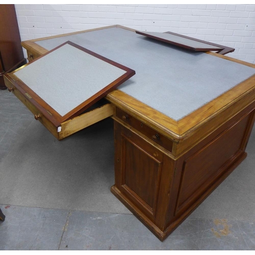 413 - Mahogany partner's desk, the rectangular top with a pale blue leather skivver, with a drawer to each... 