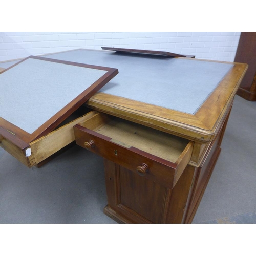 413 - Mahogany partner's desk, the rectangular top with a pale blue leather skivver, with a drawer to each... 