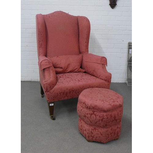 423 - Upholstered wing armchair with a matching upholstered footstool, 81 x 116 x 55cm depth (2)