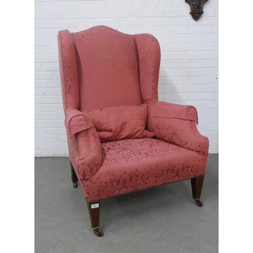 423 - Upholstered wing armchair with a matching upholstered footstool, 81 x 116 x 55cm depth (2)