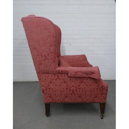 423 - Upholstered wing armchair with a matching upholstered footstool, 81 x 116 x 55cm depth (2)