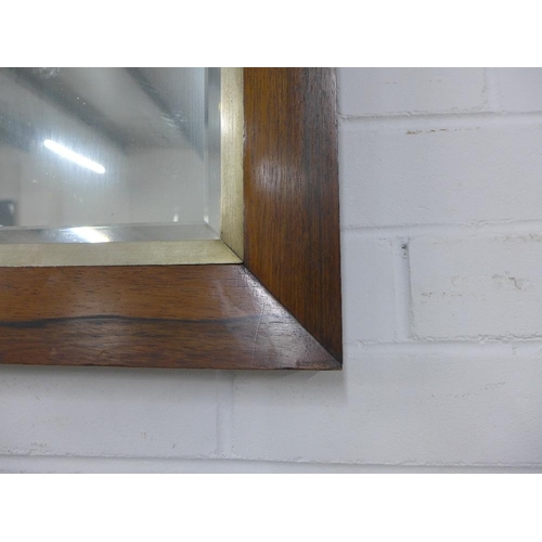 426 - Rosewood framed mirror with a rectangular bevelled edge plate, size overall 46 x 57cm