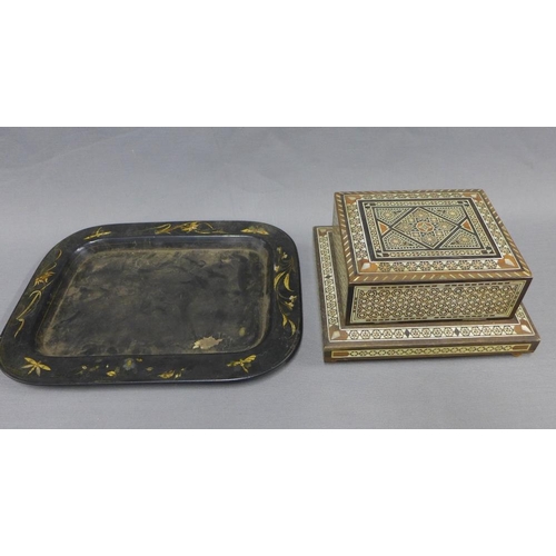 437 - Eastern inlaid musical cigarette box and a rectangular lacquered tray, largest 34cm long (2)