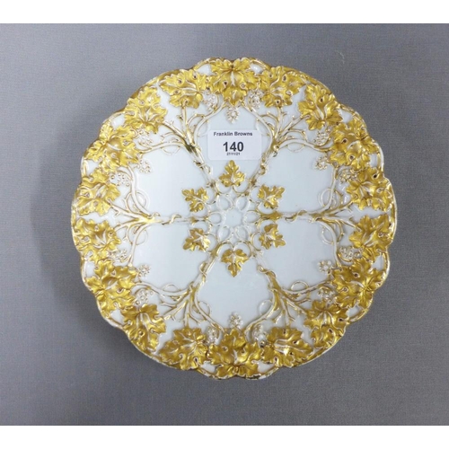 140 - Meissen white glazed moulded dish with vine and berry gilt pattern, blue crossed swords mark