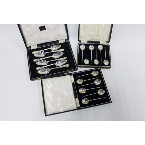 73 - Cased sets of silver spoons to include two sets of six coffee bean handled spoons and a set of six g... 