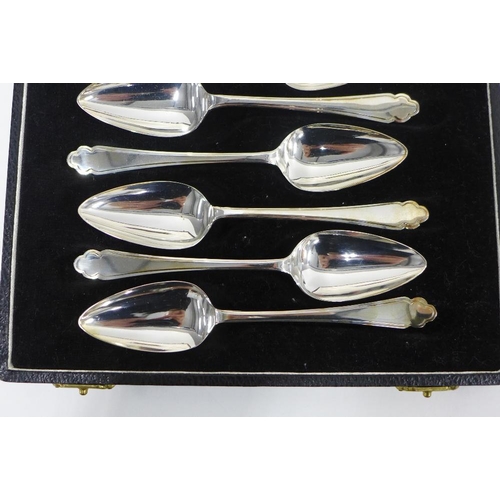 73 - Cased sets of silver spoons to include two sets of six coffee bean handled spoons and a set of six g... 