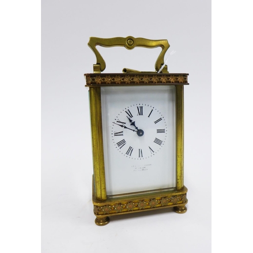 76 - French carriage clock, brass case with glass panels, enamel dial with Roman numerals, inscribed Loga... 