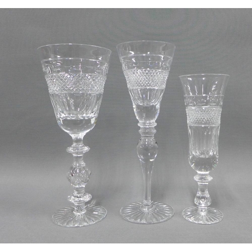 84 - A suite of Cumbrian Crystal hand blown drinking glasses in the Grassmere pattern to include 8 balust... 