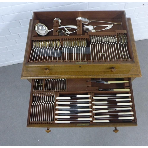 215 - Oak canteen table containing a suite of Epns flatware, 74 x 78 x 47cm