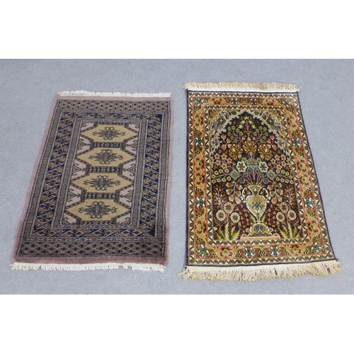 225 - Two Eastern prayer mats, one of Bokhara design the other a garden pattern, largest is 97 x 62cm (2)