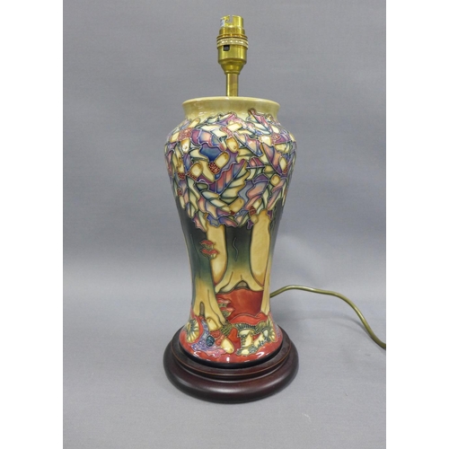 360 - Moorcroft table lamp on a wooden base, height including fitting 37cm