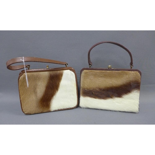 361 - Two vintage leather handbags together with an animal skin pelt / rug (3)