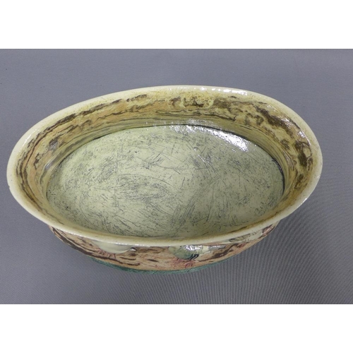 374 - Anna Lambert oval pottery bowl with a birds pattern, signed, 35cm long