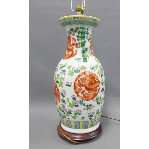 380 - Large Chinese famille vert table lamp on a wooden base, height excluding fitting 50cm