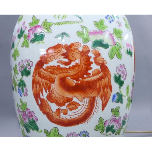 380 - Large Chinese famille vert table lamp on a wooden base, height excluding fitting 50cm