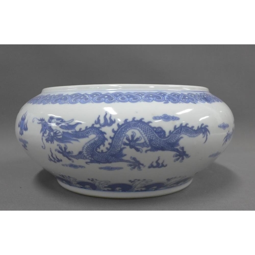 397 - Collection of modern chinoiserie blue and white items to include a jar and cover, bowl and a charger... 