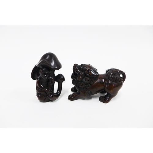 403 - A collection of five wooden netsukes to include a lion, rats, children and a ball, longest 6cm (5)